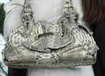 Your handbag it always stays beautiful and elegant Your handbag it always stays beautiful and elegant