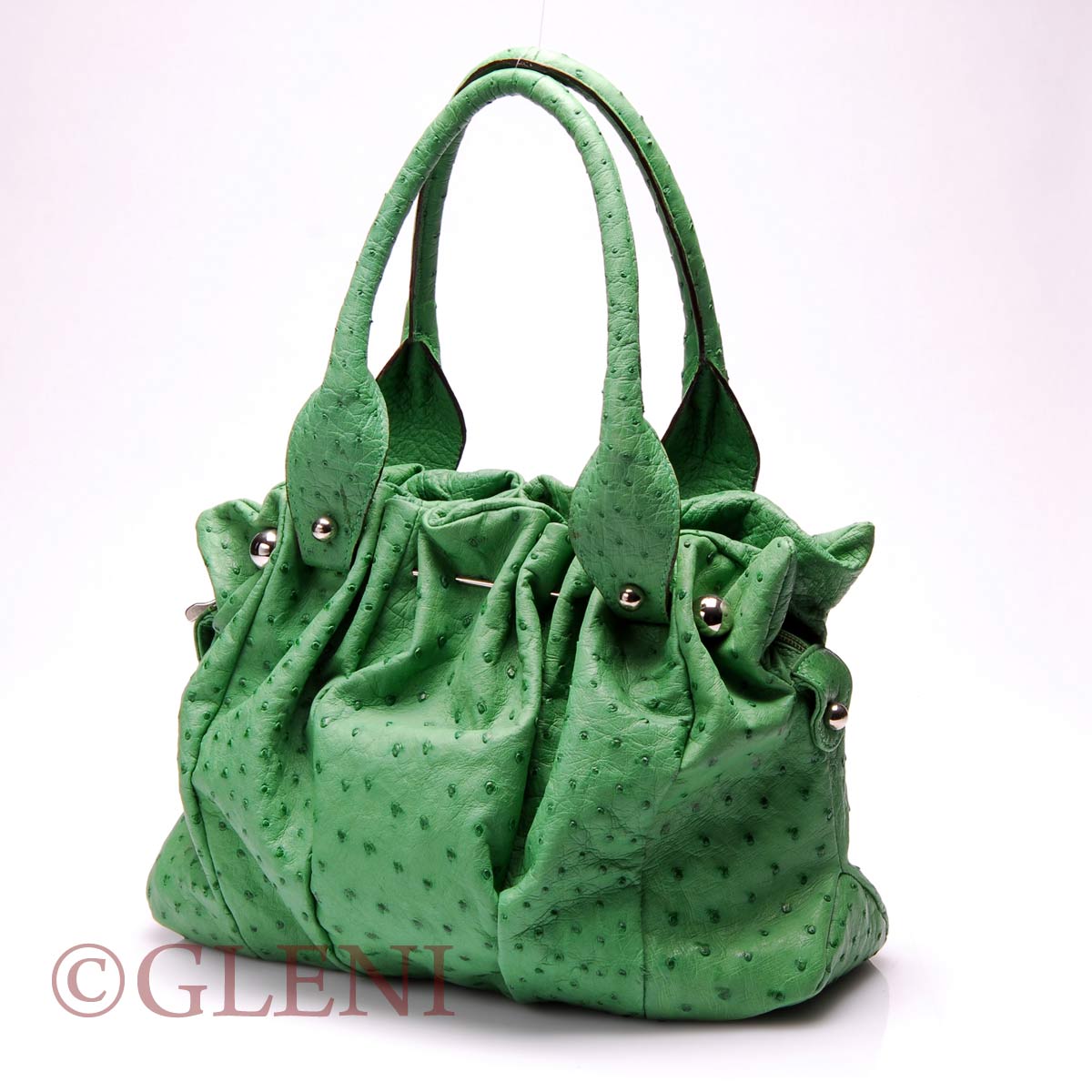 Luxury handbag  in green ostrich leather