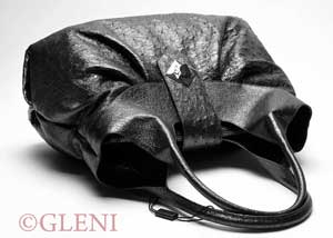 Black italian handbag in ostrich leather skin