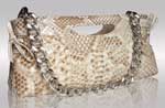 Beige color python leather clutche